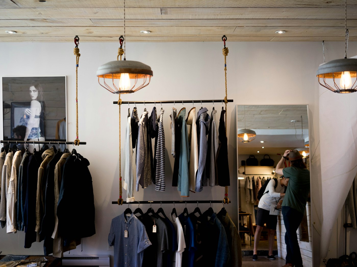 Interior of a fashion boutique with clothing displays